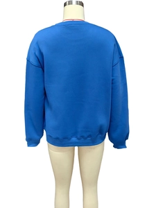 Back view of loose fit royal blue long sleeve sweatshirt with ribbed crew neck for autumn