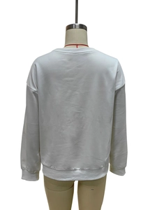Back view of a white crewneck sweatshirt with ribbed cuffs and drop shoulder design