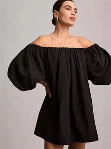 Elegant black off-the-shoulder mini dress featuring voluminous puff sleeves and A-line cut