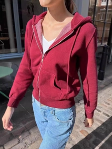 Women's burgundy zip-up hoodie with drawstring and pockets for casual outdoor wear