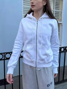 Women's white zip-up hoodie and grey sweatpants with New York print sport outfit