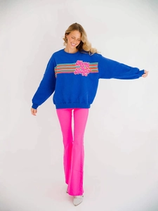 Women's blue Merry and Bright long sleeve sweatshirt with pink flared pants for Christmas