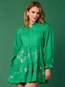 Green long sleeve Christmas tiered shirt dress featuring colorful light bulb prints