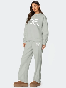 Ensemble d'automne gris pour femme avec sweat ample, pantalon large et motif nœud