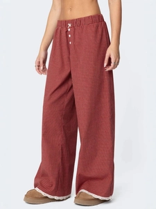 Pantaloni lounge a scacchi bianchi e rossi con vita elastica e bordo in pizzo