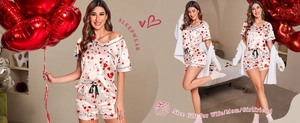Detalle de pijama de satén con estampado de corazones, ribetes negros y cordón ajustable