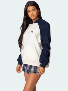 Felpa con cappuccio da donna bicolore avorio e blu navy con ricamo a fiocco stile college