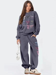 Women's dark gray fleece tracksuit with colorful bow patterns and loose sweatshirt