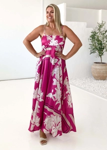 Close-up of fuchsia floral print on silky satin backless maxi dress for women