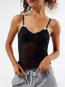 Polka dot mesh camisole for women with white lace trim and bow accents on straps