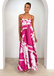 Detailed macro view of white floral print on magenta high-waist summer A-line dress