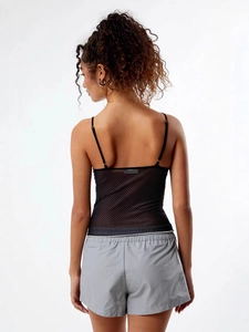 Polka dot mesh camisole with bow detail and grey shorts set shown from the back view
