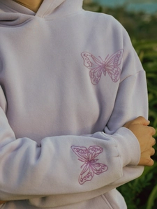 Lavender embroidered hoodie for women featuring butterfly patterns and soft fleece fabric