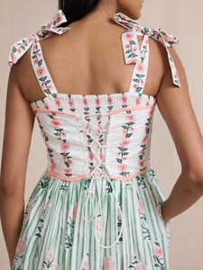 Boho floral tiered maxi dress with tie shoulders and corset-style back lace-up detail
