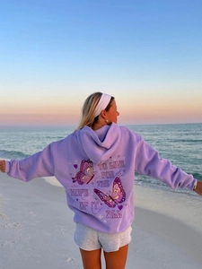Lavender hoodie with butterfly embroidery and quote on beach sunset background