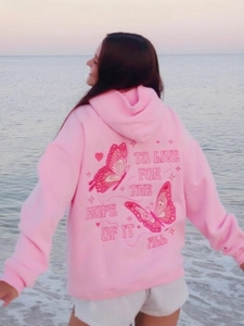 Pink oversized butterfly hoodie with floral embroidery and poetic lettering back view