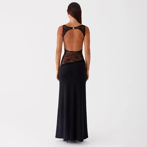 Detail of sexy backless black maxi dress with lace trim and elegant open back design
