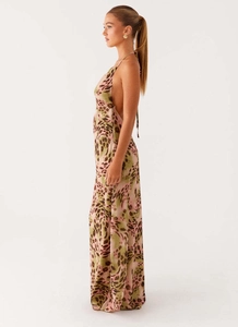 Detailed side view of backless leopard print maxi dress with elegant plunging neckline
