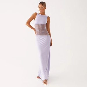 Detail of lavender slim fit maxi dress featuring intricate floral lace patchwork on waist