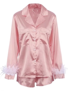 Pink satin pajama set with long sleeves and ostrich feather cuffs for women