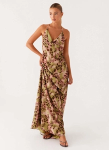 Detail of the leopard print maxi dress showing the elegant cowl neck and thin halter straps