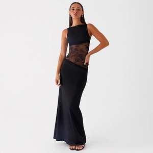 Close-up of intricate lace cut-out detail on a slim fit black backless maxi dress
