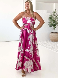 Floral print halter maxi dress in rose pink with high waist and flared A-line silhouette