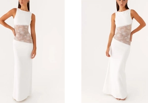 Detail of white slim fit long dress featuring intricate floral lace waist patchwork design