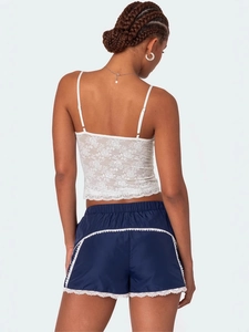 Ensemble d'été femme caraco en dentelle blanche et short en satin bleu marine dos