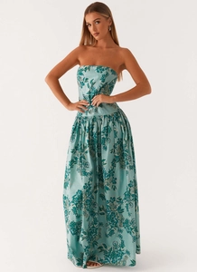 Detail of bohemian strapless floral maxi dress with teal pattern and pleated A-line skirt