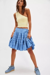 Blue tiered ruffle mini skirt featuring drawstring tassels and lightweight fabric layers
