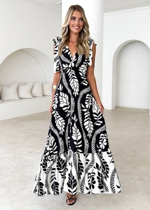 Detail view of v-neck sleeveless floral maxi dress with elegant shoulder tie ribbons