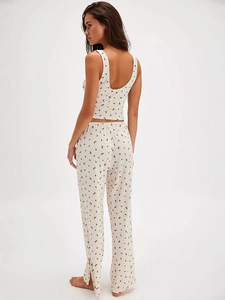 Women's floral V-neck pajama set with sleeveless top and side-slit long trousers