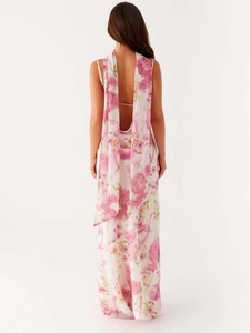 Robe longue fleurie dos nu élégante avec détails de bretelles à nouer au cou