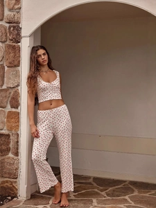 Women's floral V-neck pajama set with crop tank top and wide-leg trousers