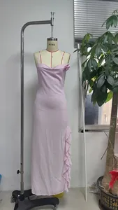 Detail showing side slit with cascading ruffles on pink sleeveless maxi dress