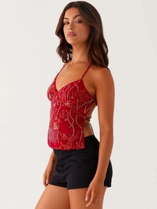 Débardeur rouge à paillettes avec col en V profond et lacets latéraux pour femme