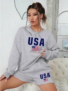 Detailed texture of grey knitted fabric with USA letter and flag print on casual set