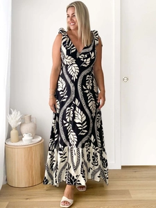 Summer V-neck sleeveless maxi dress with black floral print and bow tie straps