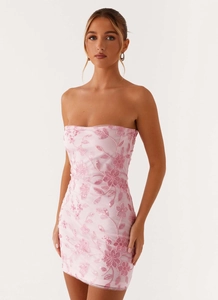 Close-up of pink strapless mini dress featuring 3D floral embroidery and sequins details