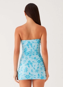 Detailed back view of a light blue mini dress with floral sequins and bead embroidery