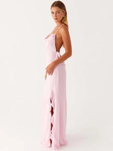 Elegant light pink backless maxi dress with 3D floral accent and side slit ruffle details