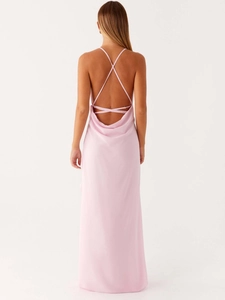 Elegant backless pink satin maxi dress with crisscross straps and a sleek slim fit