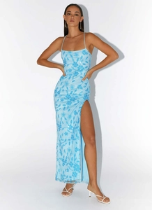 Detail of light blue sequin floral embroidery on a slim fit halter dress with high slit