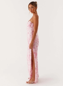Detailed view of pink sequin floral embroidery on a sexy high-slit backless evening dress