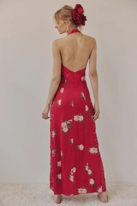 Detail of red floral maxi dress showing V-shaped lace splicing and backless design