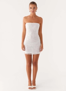 Detail of the intricate white floral embroidery and sequins on this mini tube dress
