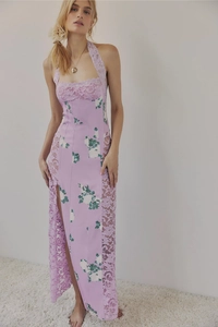 Detail of purple floral lace maxi dress with halter neck and sheer side panels