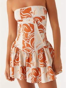 Sexy tube top backless dress with orange and blue floral print and pleated hem