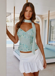 Detail of mint green sequin camisole with floral embroidery and matching chiffon scarf